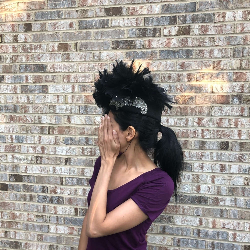 Black feather fascinator hat rhinestone detail